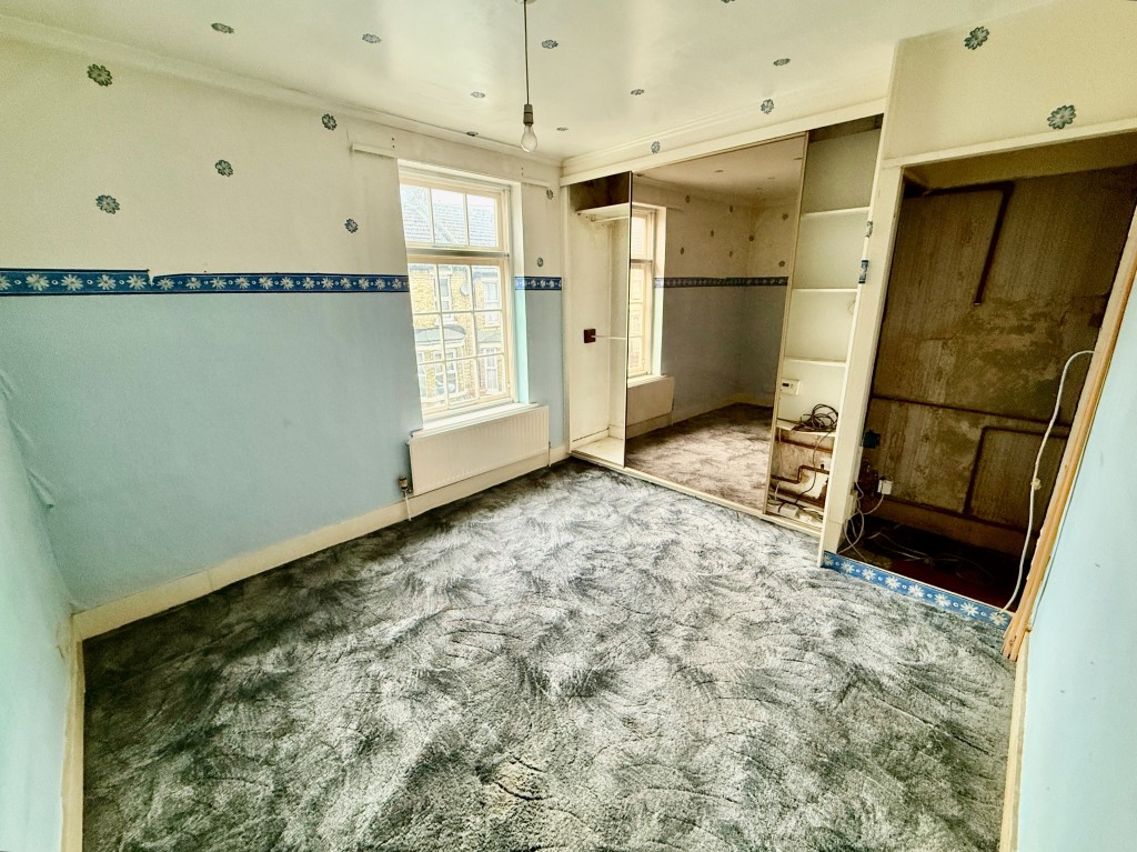 Lot: 113 - MID-TERRACE HOUSE FOR REFURBISHMENT - Bedroom one